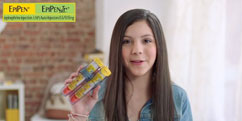 Girl holding auto injectors